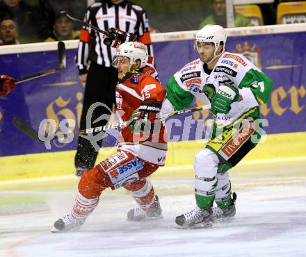 EBEL. Eishockey Bundesliga. EC KAC gegen HDD TELEMACH Olimpija Ljubljana. David Schuller,  (KAC), Kevin De Vergilio  (Laibach). Klagenfurt, am 1.1.2013.
Foto: Kuess 


---
pressefotos, pressefotografie, kuess, qs, qspictures, sport, bild, bilder, bilddatenbank