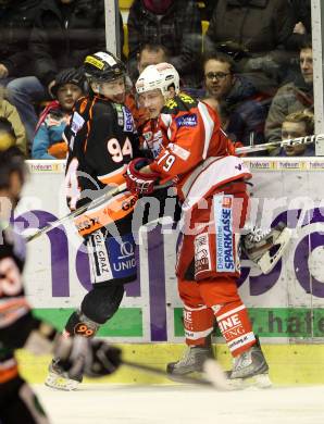 EBEL. Eishockey Bundesliga. EC KAC gegen Moser Medical Graz 99ers.   Kevin Doell, (KAC), Taylor Holst  (Graz). Klagenfurt, am 6.1.2013.
Foto: Kuess 


---
pressefotos, pressefotografie, kuess, qs, qspictures, sport, bild, bilder, bilddatenbank