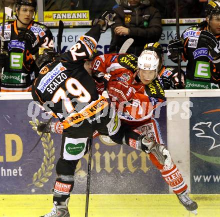 EBEL. Eishockey Bundesliga. EC KAC gegen Moser Medical Graz 99ers.   Stefan Geier, (KAC),  Mario Scalzo (Graz). Klagenfurt, am 6.1.2013.
Foto: Kuess 


---
pressefotos, pressefotografie, kuess, qs, qspictures, sport, bild, bilder, bilddatenbank