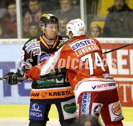 EBEL. Eishockey Bundesliga. EC KAC gegen Moser Medical Graz 99ers.   Jamie Lundmark, (KAC),  Olivier Labelle (Graz). Klagenfurt, am 6.1.2013.
Foto: Kuess 


---
pressefotos, pressefotografie, kuess, qs, qspictures, sport, bild, bilder, bilddatenbank