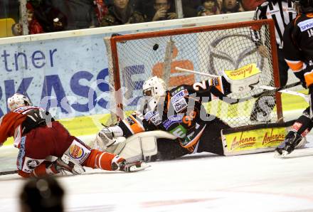 EBEL. Eishockey Bundesliga. EC KAC gegen Moser Medical Graz 99ers.    Jamie Lundmark,  (KAC), Frederic Cloutier (Graz).. Klagenfurt, am 6.1.2013.
Foto: Kuess 


---
pressefotos, pressefotografie, kuess, qs, qspictures, sport, bild, bilder, bilddatenbank