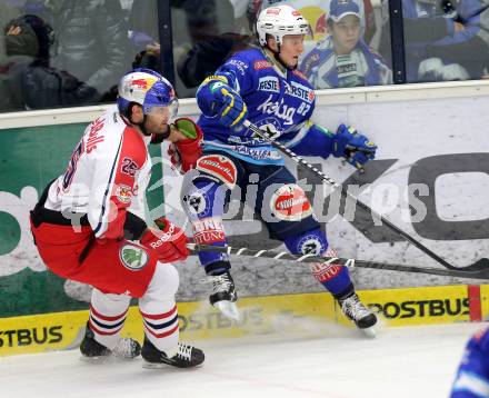 EBEL. Eishockey Bundesliga. EC VSV gegen EC Red Bull Salzburg. Antti Pusa,  (VSV), Robert Davison (Salzburg). Villach, am 11.1.2013.
Foto: Kuess 


---
pressefotos, pressefotografie, kuess, qs, qspictures, sport, bild, bilder, bilddatenbank