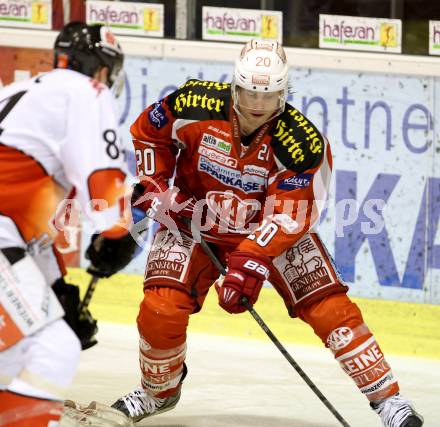 EBEL. Eishockey Bundesliga. EC KAC gegen HC TWK Innsbruck "Die Haie".   John Lammers, (KAC), Stefan Pittl  (Innsbruck). Klagenfurt, am 15.1.2013.
Foto: Kuess 


---
pressefotos, pressefotografie, kuess, qs, qspictures, sport, bild, bilder, bilddatenbank