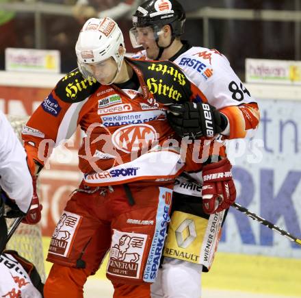 EBEL. Eishockey Bundesliga. EC KAC gegen HC TWK Innsbruck "Die Haie".   Florian Iberer, (KAC), Stefan Pittl  (Innsbruck). Klagenfurt, am 15.1.2013.
Foto: Kuess 


---
pressefotos, pressefotografie, kuess, qs, qspictures, sport, bild, bilder, bilddatenbank