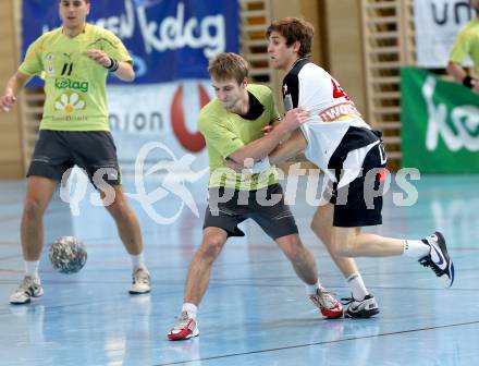 Handball Bundesliga. HC Kelag Kaernten gegen SC Ferlach. Markus Godec,  (HCK), Lukas Huss (SCF). Klagenfurt,19.1.2013.
Foto: Kuess
---
pressefotos, pressefotografie, kuess, qs, qspictures, sport, bild, bilder, bilddatenbank