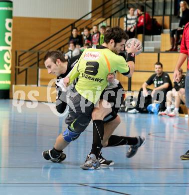 Handball Bundesliga. HC Kelag Kaernten gegen SC Ferlach. Josef Spurek,  (HCK), Izudin Mujanovic (SCF). Klagenfurt,19.1.2013.
Foto: Kuess
---
pressefotos, pressefotografie, kuess, qs, qspictures, sport, bild, bilder, bilddatenbank