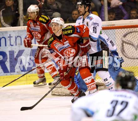 EBEL. Eishockey Bundesliga. EC KAC gegen SAPA Fehervar AV19.  Paul Schellander,  (KAC), Arnold Varga (Alba Volan). Klagenfurt, am 20.1.2013.
Foto: Kuess 


---
pressefotos, pressefotografie, kuess, qs, qspictures, sport, bild, bilder, bilddatenbank