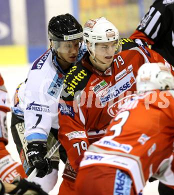 EBEL. Eishockey Bundesliga. EC KAC gegen SAPA Fehervar AV19.  Kevin Doell, (KAC), Roland Hajos  (Alba Volan). Klagenfurt, am 20.1.2013.
Foto: Kuess 


---
pressefotos, pressefotografie, kuess, qs, qspictures, sport, bild, bilder, bilddatenbank