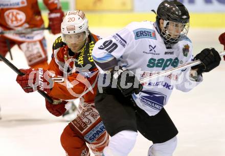 EBEL. Eishockey Bundesliga. EC KAC gegen SAPA Fehervar AV19. John Lammers,  (KAC), Ferenc Kocsis  (Alba Volan). Klagenfurt, am 20.1.2013.
Foto: Kuess 


---
pressefotos, pressefotografie, kuess, qs, qspictures, sport, bild, bilder, bilddatenbank