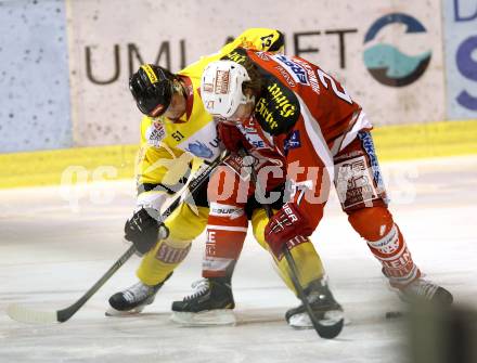 EBEL. Eishockey Bundesliga. EC KAC gegen UPC Vienna Capitals. Thomas Hundertpfund,   (KAC), Daniel Woger (Vienna). Klagenfurt, am 22.1.2013.
Foto: Kuess 


---
pressefotos, pressefotografie, kuess, qs, qspictures, sport, bild, bilder, bilddatenbank