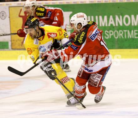 EBEL. Eishockey Bundesliga. EC KAC gegen UPC Vienna Capitals. Thomas Koch, (KAC),  Francois Fortier  (Vienna). Klagenfurt, am 22.1.2013.
Foto: Kuess 


---
pressefotos, pressefotografie, kuess, qs, qspictures, sport, bild, bilder, bilddatenbank