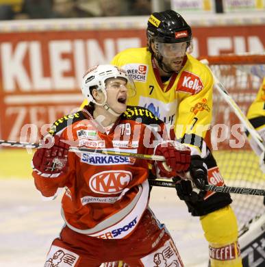 EBEL. Eishockey Bundesliga. EC KAC gegen UPC Vienna Capitals. Kevin Doell,   (KAC), Adrian Veidemann (Vienna). Klagenfurt, am 22.1.2013.
Foto: Kuess 


---
pressefotos, pressefotografie, kuess, qs, qspictures, sport, bild, bilder, bilddatenbank