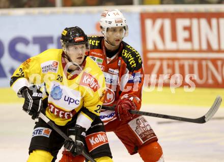 EBEL. Eishockey Bundesliga. EC KAC gegen UPC Vienna Capitals. Johannes Reichel, (KAC),  Marcus Olsson  (Vienna). Klagenfurt, am 22.1.2013.
Foto: Kuess 


---
pressefotos, pressefotografie, kuess, qs, qspictures, sport, bild, bilder, bilddatenbank