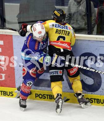 EBEL. Eishockey Bundesliga. EC VSV gegen UPC Vienna Capitals. Andreas Wiedergut, (VSV), Rafael Rotter  (Vienna). Villach, am 27.1.2013.
Foto: Kuess 


---
pressefotos, pressefotografie, kuess, qs, qspictures, sport, bild, bilder, bilddatenbank