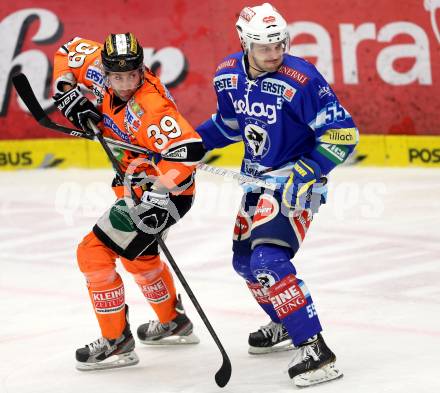 EBEL. Eishockey Bundesliga. EC VSV gegen Moser Medical Graz 99ers.  Scott Hotham, (VSV), Greg Day  (Graz). Villach, am 31.1.2013.
Foto: Kuess 


---
pressefotos, pressefotografie, kuess, qs, qspictures, sport, bild, bilder, bilddatenbank