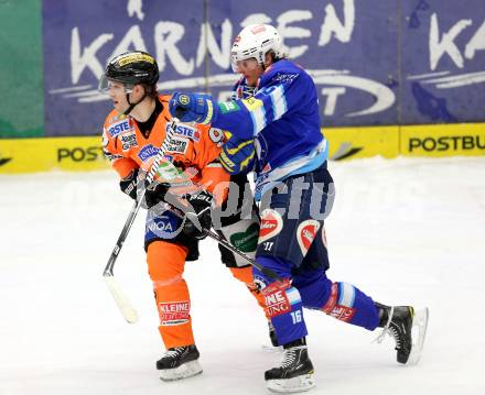 EBEL. Eishockey Bundesliga. EC VSV gegen Moser Medical Graz 99ers.  Daniel Nageler,  (VSV), Robert Wren (Graz). Villach, am 31.1.2013.
Foto: Kuess 


---
pressefotos, pressefotografie, kuess, qs, qspictures, sport, bild, bilder, bilddatenbank