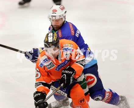 EBEL. Eishockey Bundesliga. EC VSV gegen Moser Medical Graz 99ers.  Gerhard Unterluggauer,,  (VSV), Jean Michel Daoust (Graz). Villach, am 31.1.2013.
Foto: Kuess 


---
pressefotos, pressefotografie, kuess, qs, qspictures, sport, bild, bilder, bilddatenbank