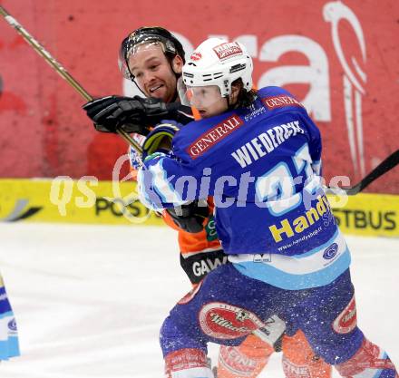 EBEL. Eishockey Bundesliga. EC VSV gegen Moser Medical Graz 99ers.  Andreas Wiedergut,  (VSV), Olivier Latendresse (Graz). Villach, am 31.1.2013.
Foto: Kuess 


---
pressefotos, pressefotografie, kuess, qs, qspictures, sport, bild, bilder, bilddatenbank