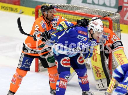 EBEL. Eishockey Bundesliga. EC VSV gegen Moser Medical Graz 99ers.  Scott Hotham,  (VSV), Rodney Coleman Jarrett (Graz). Villach, am 31.1.2013.
Foto: Kuess 


---
pressefotos, pressefotografie, kuess, qs, qspictures, sport, bild, bilder, bilddatenbank