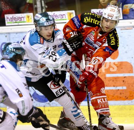 EBEL. Eishockey Bundesliga. EC KAC gegen EHC LIWEST Linz.  John Lammers,  (KAC), Mike Ouellette (Linz). Klagenfurt, am 13.2.2013.
Foto: Kuess 


---
pressefotos, pressefotografie, kuess, qs, qspictures, sport, bild, bilder, bilddatenbank