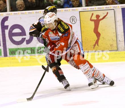 EBEL. Eishockey Bundesliga. EC KAC gegen Moser Medical Graz 99ers.   Thomas Hundertpfund,  (KAC), Taylor Holst (Graz). Klagenfurt, am 15.2.2013.
Foto: Kuess 


---
pressefotos, pressefotografie, kuess, qs, qspictures, sport, bild, bilder, bilddatenbank