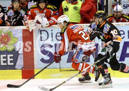 EBEL. Eishockey Bundesliga. EC KAC gegen Moser Medical Graz 99ers.   Thomas Hundertpfund, (KAC), Zintis-Nauris Zusevics  (Graz). Klagenfurt, am 15.2.2013.
Foto: Kuess 


---
pressefotos, pressefotografie, kuess, qs, qspictures, sport, bild, bilder, bilddatenbank