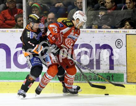 EBEL. Eishockey Bundesliga. EC KAC gegen Moser Medical Graz 99ers. Stephan Geier,  (KAC), Dustin Vanballegooie (Graz). Klagenfurt, am 24.2.2013.
Foto: Kuess 


---
pressefotos, pressefotografie, kuess, qs, qspictures, sport, bild, bilder, bilddatenbank