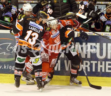 EBEL. Eishockey Bundesliga. EC KAC gegen Moser Medical Graz 99ers. Kevin Doell,  (KAC), Olivier Labelle, Jan Novak (Graz). Klagenfurt, am 24.2.2013.
Foto: Kuess 


---
pressefotos, pressefotografie, kuess, qs, qspictures, sport, bild, bilder, bilddatenbank