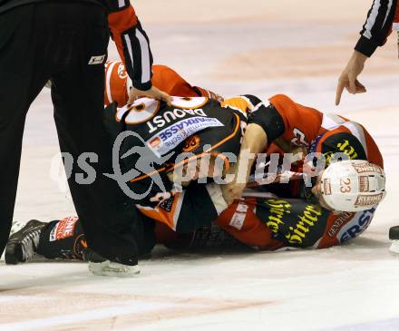 EBEL. Eishockey Bundesliga. EC KAC gegen Moser Medical Graz 99ers. Rauferei Mike Siklenka,  (KAC), Jean-Michel Daoust (Graz). Klagenfurt, am 1.3.2013.
Foto: Kuess 


---
pressefotos, pressefotografie, kuess, qs, qspictures, sport, bild, bilder, bilddatenbank