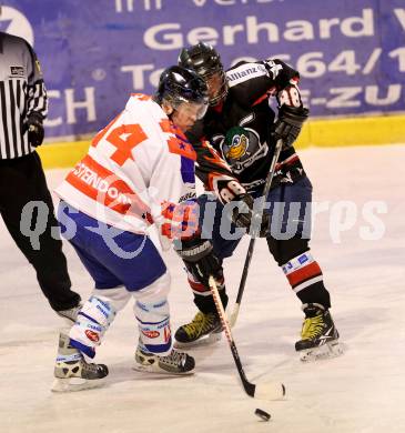 Eishockeycup. Ducks gegen Narren Steindorf. Manfred Greschonig (Ducks), Martin Trauntschnig (Steindorf). Steindorf, 2.3.2013.
Foto: Kuess
---
pressefotos, pressefotografie, kuess, qs, qspictures, sport, bild, bilder, bilddatenbank