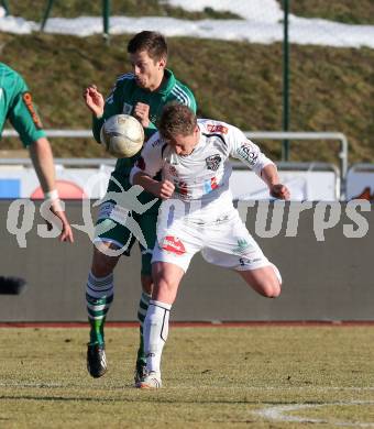 Fussball. Bundesliga. RZ Pellets WAC gegen SK Rapid Wien.  Christian Thonhofer,  (WAC), Thomas Schrammel  (Rapid). Wolfsberg, 3.3.2013.
Foto: Kuess

---
pressefotos, pressefotografie, kuess, qs, qspictures, sport, bild, bilder, bilddatenbank