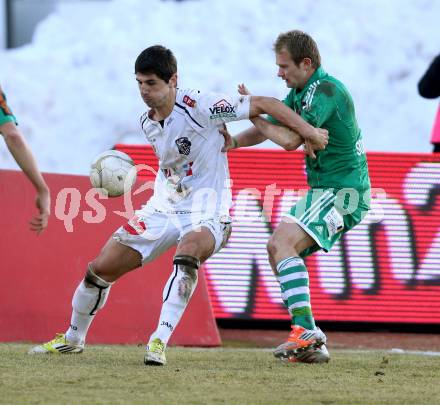 Fussball. Bundesliga. RZ Pellets WAC gegen SK Rapid Wien. Mihret Topcagic,    (WAC), Mario Sonnleitner (Rapid). Wolfsberg, 3.3.2013.
Foto: Kuess

---
pressefotos, pressefotografie, kuess, qs, qspictures, sport, bild, bilder, bilddatenbank