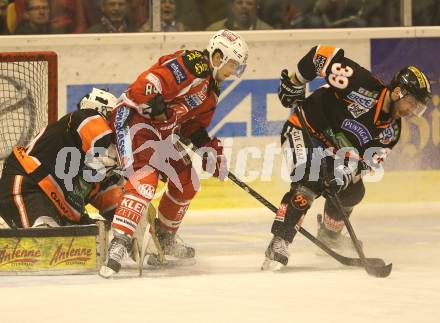 EBEL. Eishockey Bundesliga. KAC gegen Moser Medical Graz 99ers. Raphael Herburger (KAC), Frederic Cloutier, Trevor Frischmon (Graz). Klagenfurt, am 5.3.2013.
Foto: Kuess
---
pressefotos, pressefotografie, kuess, qs, qspictures, sport, bild, bilder, bilddatenbank