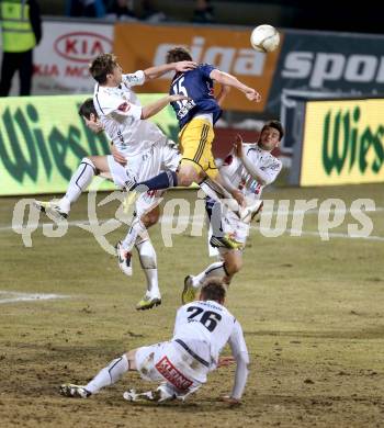 Fussball. Bundesliga. RZ Pellets WAC gegen  FC Red Bull Salzburg.  Boris Huettenbrenner, Roland Putsche,  (WAC), Franz Schiemer  (Salzburg). Wolfsberg, 6.3.2013.
Foto: Kuess

---
pressefotos, pressefotografie, kuess, qs, qspictures, sport, bild, bilder, bilddatenbank