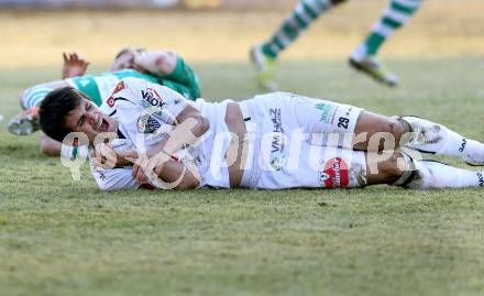 Fussball. Bundesliga. RZ Pellets WAC gegen SK Rapid Wien. verletzt Mihret Topcagic (WAC). Wolfsberg, 3.3.2013.
Foto: Kuess

---
pressefotos, pressefotografie, kuess, qs, qspictures, sport, bild, bilder, bilddatenbank