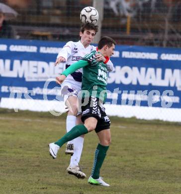 Fussball Regionalliga. SAK gegen Feldkirchen SV. Martin Lenosek,  (SAK), Michel Micossi (Feldkirchen). Klagenfurt, 9.3.2013.
Foto: Kuess
---
pressefotos, pressefotografie, kuess, qs, qspictures, sport, bild, bilder, bilddatenbank