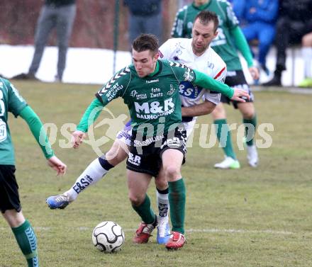 Fussball Regionalliga. SAK gegen Feldkirchen SV.  Goran Jolic, (SAK), Mathias Regal (Feldkirchen). Klagenfurt, 9.3.2013.
Foto: Kuess
---
pressefotos, pressefotografie, kuess, qs, qspictures, sport, bild, bilder, bilddatenbank