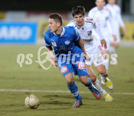 Fussball. Bundesliga. RZ Pellets WAC gegen SC Wiener Neustadt.  Mihret Topcagic,  (WAC), Christian Ramsebner  (Wiener Neustadt). Wolfsberg, 16.3.2013.
Foto: Kuess

---
pressefotos, pressefotografie, kuess, qs, qspictures, sport, bild, bilder, bilddatenbank