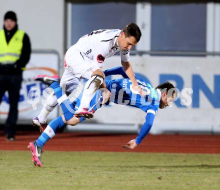 Fussball. Bundesliga. RZ Pellets WAC gegen SC Wiener Neustadt.  Michael Liendl,  (WAC), Herbert Rauter  (Wiener Neustadt). Wolfsberg, 16.3.2013.
Foto: Kuess

---
pressefotos, pressefotografie, kuess, qs, qspictures, sport, bild, bilder, bilddatenbank