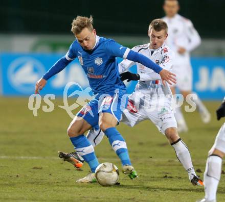 Fussball. Bundesliga. RZ Pellets WAC gegen SC Wiener Neustadt.  Manuel Kerhe,   (WAC), Dominik Hofbauer (Wiener Neustadt). Wolfsberg, 16.3.2013.
Foto: Kuess

---
pressefotos, pressefotografie, kuess, qs, qspictures, sport, bild, bilder, bilddatenbank