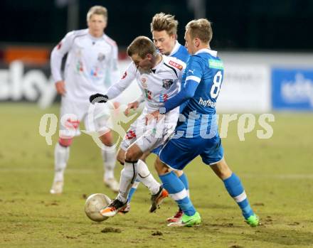 Fussball. Bundesliga. RZ Pellets WAC gegen SC Wiener Neustadt.   Manuel Kerhe,  (WAC), Stefan Rakowitz, Dominik Hofbauer (Wiener Neustadt). Wolfsberg, 16.3.2013.
Foto: Kuess

---
pressefotos, pressefotografie, kuess, qs, qspictures, sport, bild, bilder, bilddatenbank