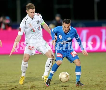 Fussball. Bundesliga. RZ Pellets WAC gegen SC Wiener Neustadt.  Michael Sollbauer,  (WAC), Herbert Rauter  (Wiener Neustadt). Wolfsberg, 16.3.2013.
Foto: Kuess

---
pressefotos, pressefotografie, kuess, qs, qspictures, sport, bild, bilder, bilddatenbank