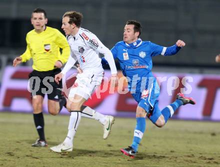 Fussball. Bundesliga. RZ Pellets WAC gegen SC Wiener Neustadt.   Mario Kroepfl, (WAC), Herbert Rauter  (Wiener Neustadt). Wolfsberg, 16.3.2013.
Foto: Kuess

---
pressefotos, pressefotografie, kuess, qs, qspictures, sport, bild, bilder, bilddatenbank