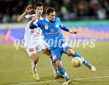 Fussball. Bundesliga. RZ Pellets WAC gegen SC Wiener Neustadt.  Mihret Topcagic,  (WAC), Manuel Wallner  (Wiener Neustadt). Wolfsberg, 16.3.2013.
Foto: Kuess

---
pressefotos, pressefotografie, kuess, qs, qspictures, sport, bild, bilder, bilddatenbank