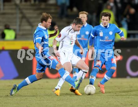 Fussball. Bundesliga. RZ Pellets WAC gegen SC Wiener Neustadt.  Ruben Rivera,  (WAC), Matthias Maak  (Wiener Neustadt). Wolfsberg, 16.3.2013.
Foto: Kuess

---
pressefotos, pressefotografie, kuess, qs, qspictures, sport, bild, bilder, bilddatenbank