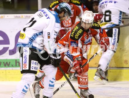 EBEL. Eishockey Bundesliga. EC KAC gegen EHC Liwest Black Wings Linz. Martin Schumnig (KAC), Patrick Leahy (Linz). Klagenfurt, am 19.3.2013.
Foto: Kuess 


---
pressefotos, pressefotografie, kuess, qs, qspictures, sport, bild, bilder, bilddatenbank