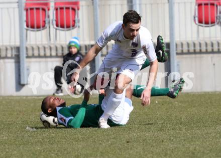 Fussball Regionalliga. SK Austria Klagenfurt gegen SV Wallern. Alexander Percher,  (Austria Klagenfurt), Harrison Kennedy (Wallern). Klagenfurt, 23.3.2013.
Foto: Kuess
---
pressefotos, pressefotografie, kuess, qs, qspictures, sport, bild, bilder, bilddatenbank