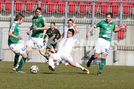 Fussball Regionalliga. SK Austria Klagenfurt gegen SV Wallern. Darko Vasic, Michael Schildberger,(Austria Klagenfurt),  Herwig Drechsel (Wallern). Klagenfurt, 23.3.2013.
Foto: Kuess
---
pressefotos, pressefotografie, kuess, qs, qspictures, sport, bild, bilder, bilddatenbank