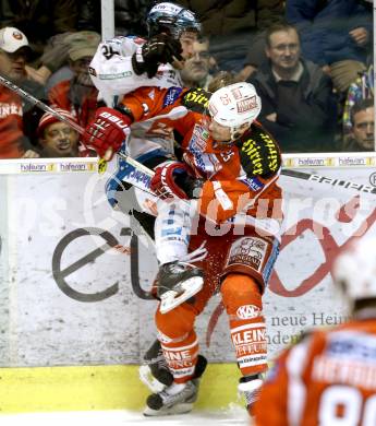 EBEL. Eishockey Bundesliga. EC KAC gegen EHC Liwest Black Wings Linz.  Kirk Furey,  (KAC), Mike Ouellette (Linz). Klagenfurt, am 24.3.2013.
Foto: Kuess 


---
pressefotos, pressefotografie, kuess, qs, qspictures, sport, bild, bilder, bilddatenbank