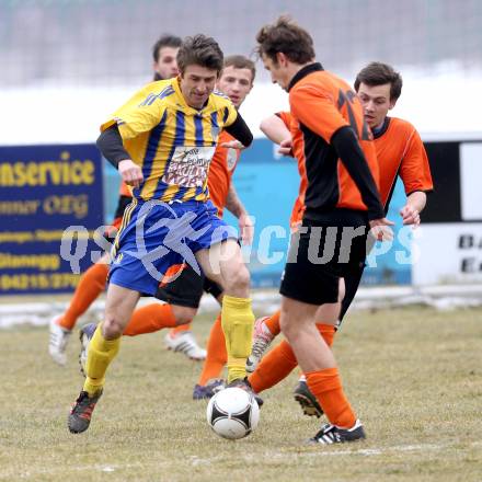 Fussball Unterliga Ost. Liebenfels gegen SPG SV Magdalensberg/Eberndorfer AC. Branko Puljic,  (Liebenfels), Stefan Rueckenbaum (Magdalensberg/Eberndorf). Liebenfels, 24.3.2013.
Foto: Kuess
---
pressefotos, pressefotografie, kuess, qs, qspictures, sport, bild, bilder, bilddatenbank